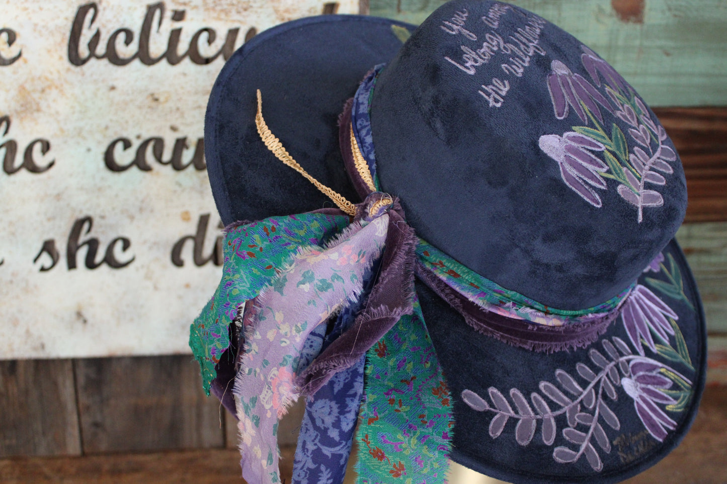 “Wildflower Melody: The Hand painted Hat with a Symphony of Style and Song”