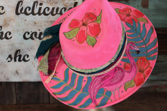 “Flamingo Fiesta: A Hand-Painted Hat with Swarovski Sparkle and Song Lyrics”