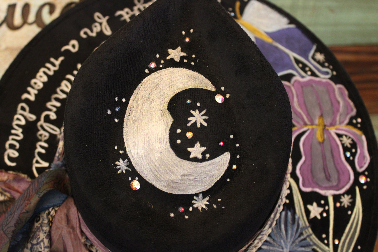 “Moonlit Blooms: A Hand-Painted Vegan Suede Hat with a Touch of the Night Sky”