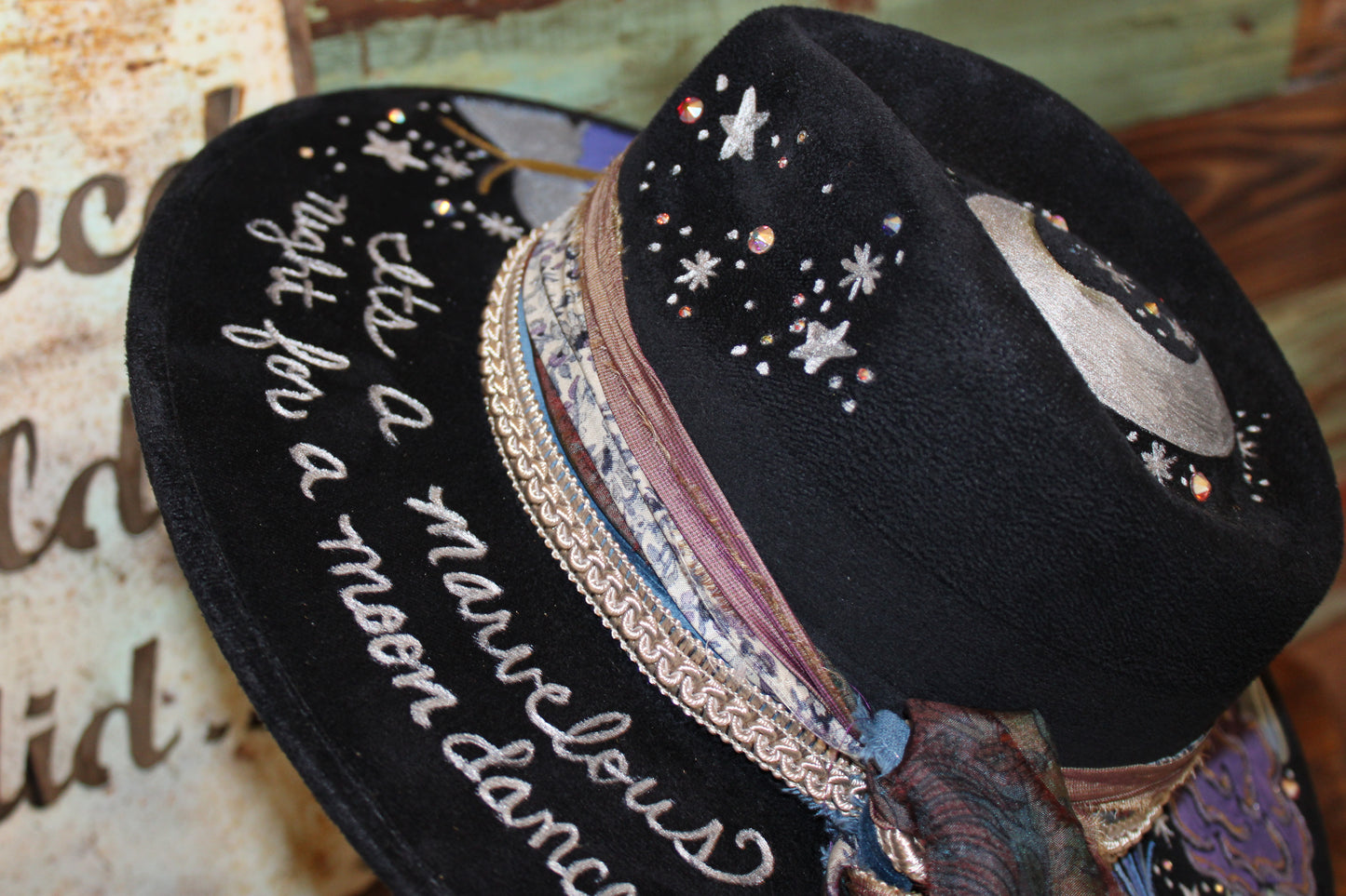 “Moonlit Blooms: A Hand-Painted Vegan Suede Hat with a Touch of the Night Sky”